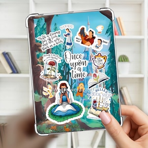 May include: A clear tablet case featuring a collage of stickers inspired by Beauty and the Beast. The stickers include characters, a rose in a glass dome, books, and text such as Once upon a time, Booknerd, and Belle's Book Shop, all set against a forest background.