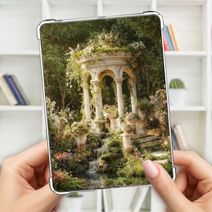May include: A tablet case featuring a picturesque garden scene with a white gazebo, cascading waterfall, and lush greenery. The image showcases a serene landscape with flowers and classical architecture, evoking a sense of tranquility.