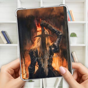 May include: A tablet case featuring a digital art print of a warrior holding a sword aloft against a fiery background. The artwork includes the text "You Do Not Yield" in a stylized font. The warrior has long blonde hair and wears dark armor.