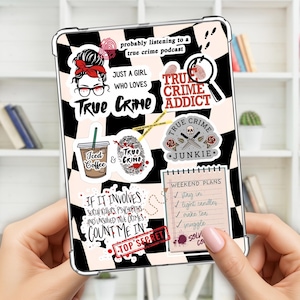 May include: A clear tablet case decorated with various stickers. The stickers feature phrases like "True Crime Addict," "Just a girl who loves true crime," and "If it involves serial killers, count me in." The case is held by a person.