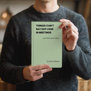May include: A green notebook with the title "Things I Can't Say Out Loud In Meetings...and other work notes" by Henry Weaver.