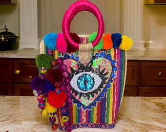 Handmade Mexican Palm Tote: Woven Straw Bag with Pom Poms & Heart/Eye Design