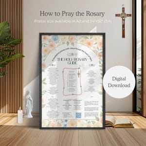 Könnte beinhalten: Ein gerahmtes Poster mit dem Titel "How to Pray the Rosary" mit floralen Akzenten. Das Poster enthält eine Anleitung zum Rosenkranz, ein Diagramm und den Text "Digital Download". Ein Kruzifix hängt über dem Poster. Die Postergröße ist in A2 und 61cm x 81cm erhältlich.