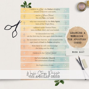 May include: A washi strips puzzle with the text "I believe in God, the Father almighty..." and "The Apostles' Creed." The image includes scissors, pencils, and a candle. The theme is learning and memorisation. The measurements are in centimetres.