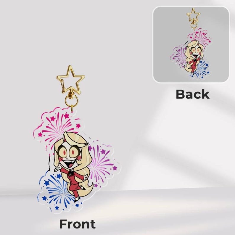 May include: An acrylic keychain featuring a cartoon character with long blonde hair and a red suit, surrounded by pink and blue firework illustrations. The charm is attached to a gold-colored star-shaped clasp, showing both front and back views.