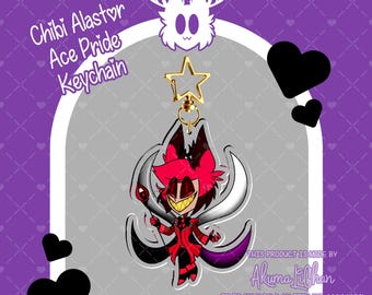 May include: A clear acrylic keychain featuring a chibi-style character with red hair, a red suit, and a wide yellow grin, holding a microphone. The keychain has a gold star-shaped clasp. Text reads Chibi Alastor Ace Pride Keychain.