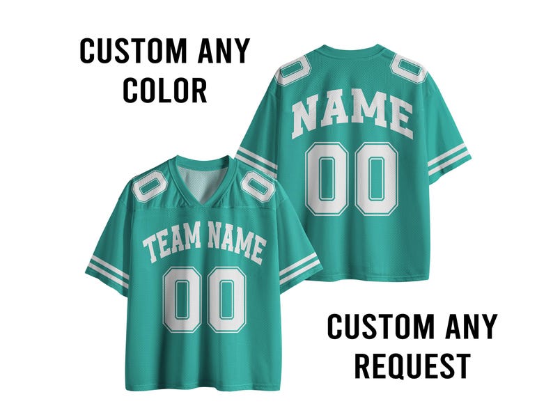 May include: Two teal football jerseys with white accents. One jersey displays "TEAM NAME" and "00", the other displays "NAME" and "00". The text "CUSTOM ANY COLOR" and "CUSTOM ANY REQUEST" are also visible.