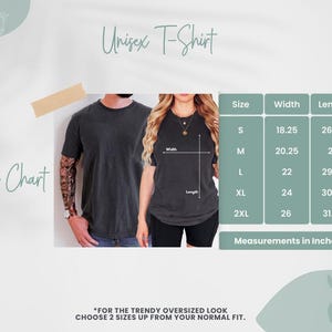 May include: A size chart for a unisex t-shirt is displayed, with measurements in inches. The chart includes sizes S to 2XL, with corresponding width and length measurements. The image also shows two people wearing the t-shirt.
