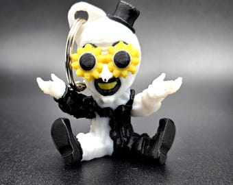 Art the Clown with sunflower glasses key chain.