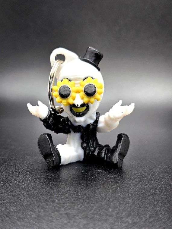 Art the Clown with sunflower glasses key chain.