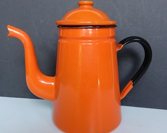 Orange enamel coffee pot.