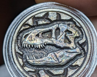 Hobo coin T Rex skull hand engraved on a 2012 silver proof quarter