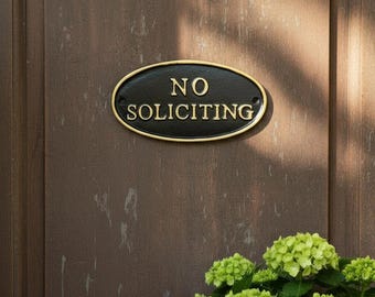No Soliciting" Oval Wall Sign, Cast Iron Black and Gold