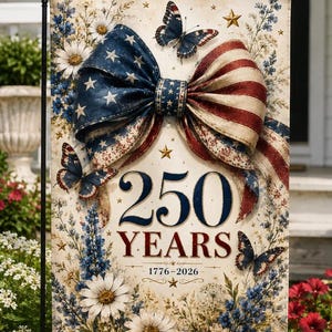 May include: A rectangular garden flag featuring a large patriotic bow with stars and stripes, surrounded by blue and white wildflowers and three butterflies. The text 250 YEARS and 1776-2026 is printed in dark blue and red lettering with gold stars.