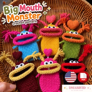 Peut inclure: Six pochettes monstres crochetées en bleu, jaune, vert, bordeaux, rose et noir, chacune avec une large bouche, deux yeux et un sommet en forme de cœur. Le texte Big Mouth Monster crochet pattern est visible avec une icône PDF.