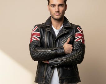 May include: Black leather jacket with a distressed finish, featuring the Union Jack flag design on the shoulders. The jacket has a quilted pattern on the sleeves and a classic biker style with a zipper closure.