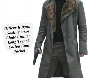 May include: A long, olive green cotton trench coat with a faux fur collar. The coat is styled after the Blade Runner 2049 film. The text on the image reads "Officer K Ryan Gosling 2049 Blade Runner Long Trench Cotton Coat Jacket."