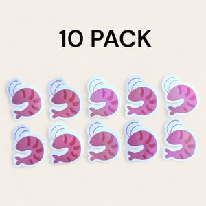 May include: Ten pack of pink iridescent shrimp stickers. The stickers are on a white background. 10 PACK is written in black text at the top of the image.