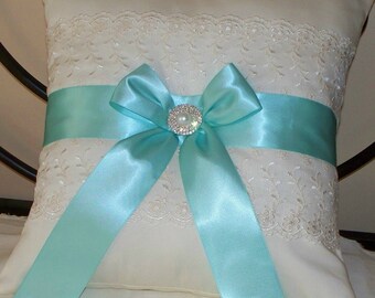 Kneeling Pillows, Set of Two, 16" x 16", Ivory Net Lace over Ivory Satin, With Aqua Band and Bow, Rhinestone/Pearl Center