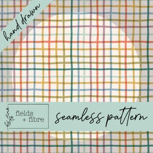 May include: A seamless pattern featuring a hand-drawn plaid design in various shades of brown, blue, red, and green. The pattern is set against a white background. The text "fields + fibre" and "seamless pattern" are included in the image.