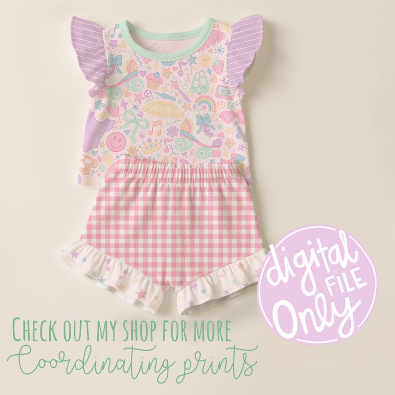 May include: A two-piece pajama set featuring a top and shorts. The top has a pastel print with various whimsical elements and ruffled sleeves. The shorts are pink and white gingham with a ruffled hem. The image also includes the text "digital file only".