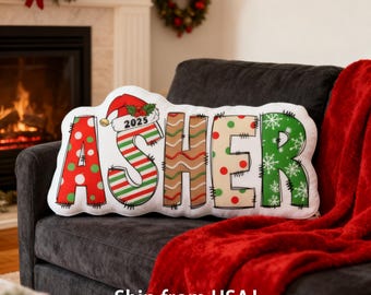 Coussin prénom personnalisé pour Noël - Coussin personnalisé pour les fêtes, cadeau de Noël pour enfant, coussin lettre bonnet de Noel, décoration d'intérieur de Noël
