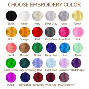 May include: Image showing a color chart with various embroidery thread colors. The text "CHOOSE EMBROIDERY COLOR" is at the top. Colors include black, white, ivory, silver gray, gray, yellow, gold, orange, red, dark gray, rose red, pink, coral, brown, green, navy blue, blue, cyan, grass green, dark green, sky blue, light blue, lavender, dark purple, purple, royal blue, burgundy, wine red, and mauve brown.