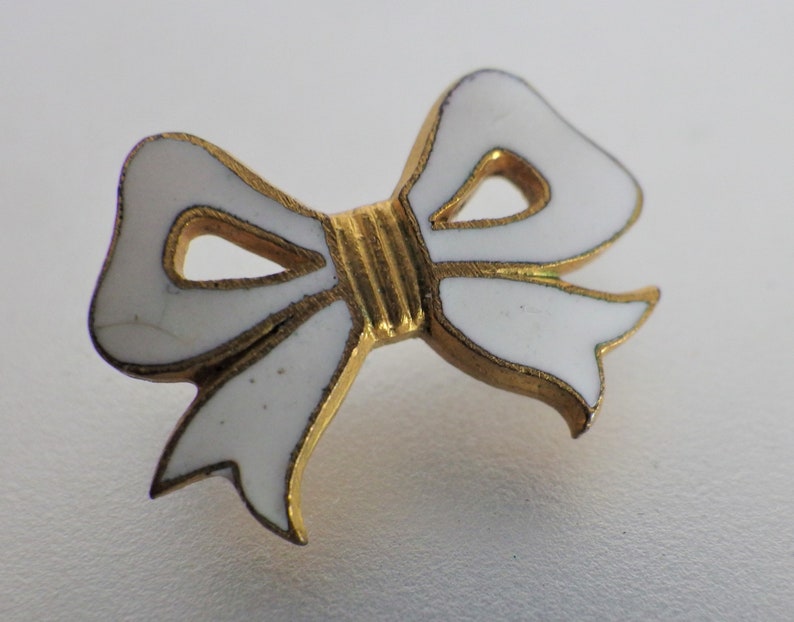 Antique White Enamel Bow Lapel Pin
