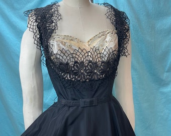 1950s W:26 Gail Peter Taffeta Black Lace Rhinestones Pearl Studs cocktail dress heart neckline circle skirt fit and flare belt