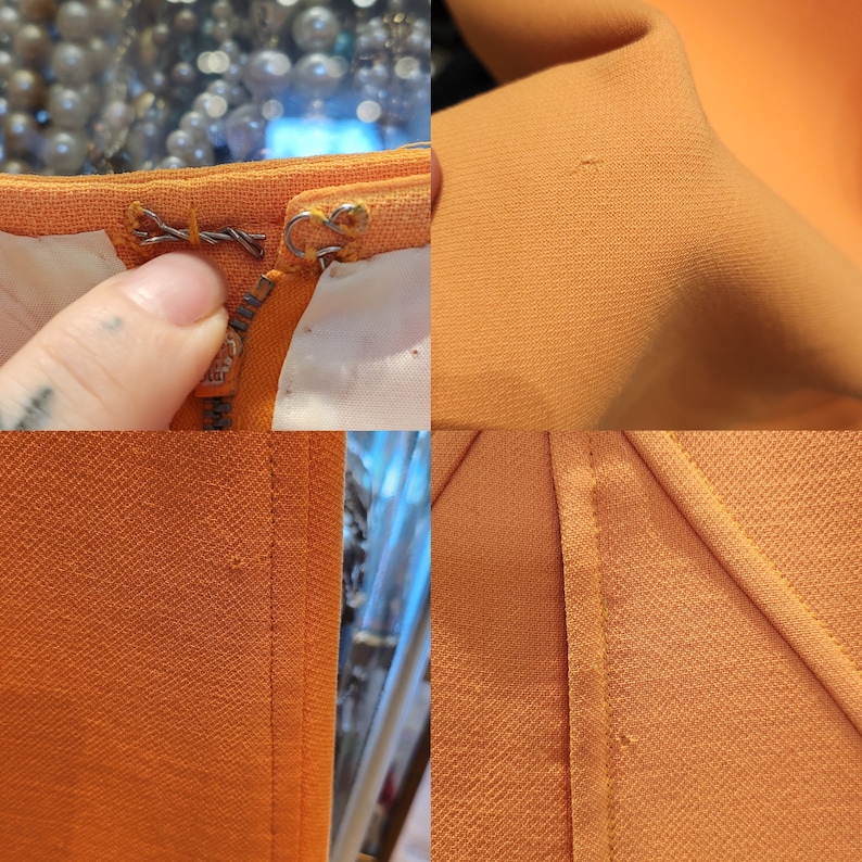 May include: Close-up of a bright orange fabric with a zip and stitching details. The fabric has a subtle texture.
