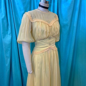 1930s/1940s W:28 yellow sheer rayon short puff sleeve illusion neckline star sequin braid trim runched shelf bust drop waist party dress
