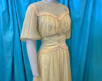 1930s/1940s W:28 yellow sheer rayon short puff sleeve illusion neckline star sequin braid trim runched shelf bust drop waist party dress