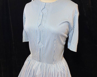 1950s/1960s W:32 blue white stripe nylon jersey short sleeve crew neck diamond cut out fit and flare day dress