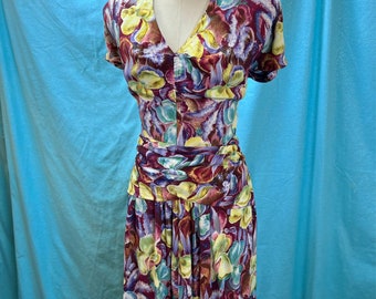 1940s W:34 burgundy pastel floral orchid print rayon crepe short sleeve V neckline runched bust wrap peplum A-line skirt Hawaiian day dress