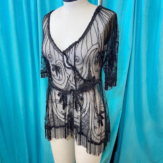 sheer peplum blouse