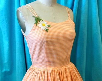 1950s/1960s W:24 orange white cotton gingham sleeveless double spaghetti strap daisy appliqué scoop neckline fit and flare day dress
