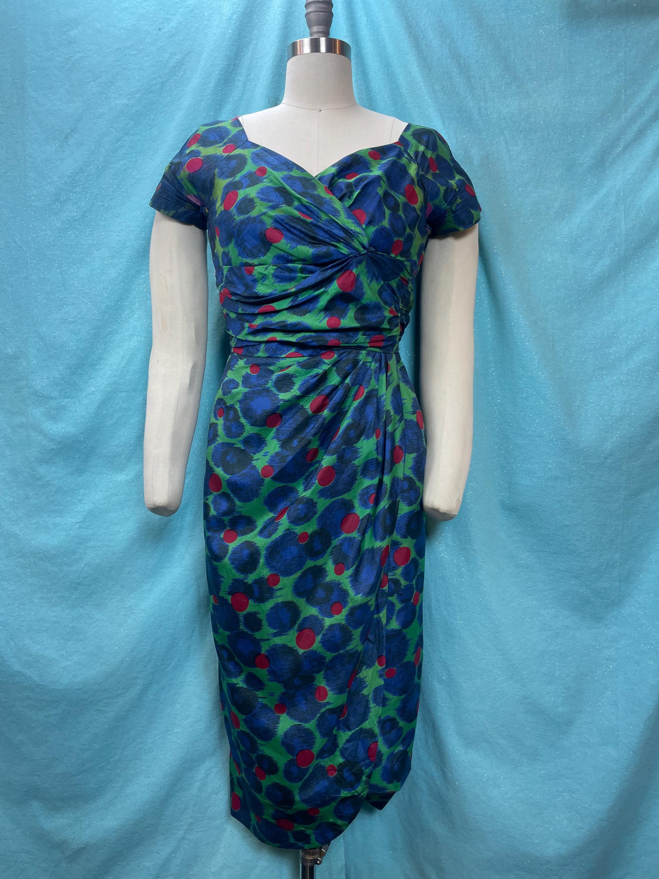 1950s W:26 Miss Brooks coctail bombshell vixen dress silk red blue green pattern short sleeve fabric by Noel Kring vintage mcm pencil wiggle 1950s W:26 Miss Brooks coctail bombshell vixen dress silk red blue green pattern short sleeve fabric by Noel Kring vintage mcm pencil wiggle