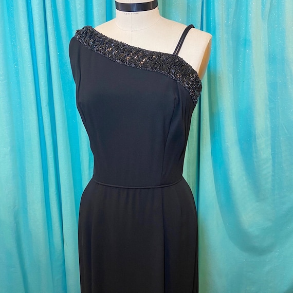 1950s1960s W:26 LBD black rayon crepe sleeveless pleated plunging neckline low back pencil wiggle cocktail dress