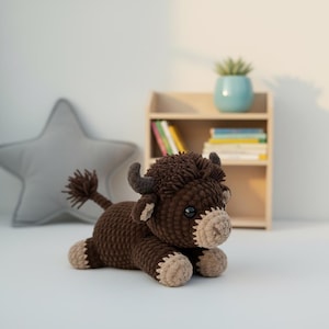 May include: A set of three ceramic mugs with a speckled, matte finish. The mugs are in shades of cream, light grey, and dark grey. Each mug has a simple, minimalist design, ideal for coffee or tea.