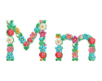May include: Embroidered floral letters "M" and "m" in a variety of colors, including red, pink, blue, and white. The letters are adorned with detailed flower designs and green leaves. The image includes the text "Each letter has ONLY 7 TRIMS" and "NO hard stitches | NO bird nesting".