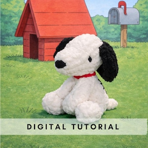 May include: A crocheted white and black dog with a red collar sits on green grass. A red dog house and a mailbox are in the background. The image includes the text "DIGITAL TUTORIAL" across the bottom.