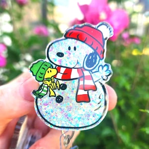 Badgehaspel hondensneeuwpop: badgehouder kerstverpleegster