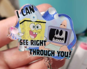 May include: A clear acrylic badge reel featuring SpongeBob SquarePants and Gary the Snail. The badge reel has the text "I CAN SEE RIGHT THROUGH YOU!". The reel is attached to a clear plastic clip.
