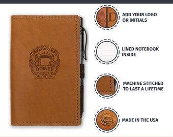 May include: A brown leather notebook cover with a pen holder and a customisable area for a logo or initials. The cover features a logo for OOWEE Products, a company based in Asheville, North Carolina. The notebook is lined and machine stitched for durability. It is made in the USA.