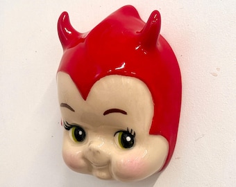 Ceramic Kewpie in Devil Bonnet | stoneware wall decor