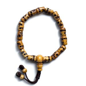 Light Brown, Yak Bone Skull Carved Wrist Mala, Buddhist Wrist Mala. Hand Craved Yak Bone Skull Beads, 8MM 16 Beads Wrist Mala, Made In Nepal