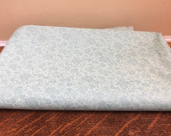 Two toned embossed look mint green fabric