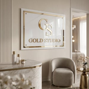 Enseigne murale en acrylique avec logo personnalisé en lettres dorées - Signalétique commerciale pour studio ou bureau