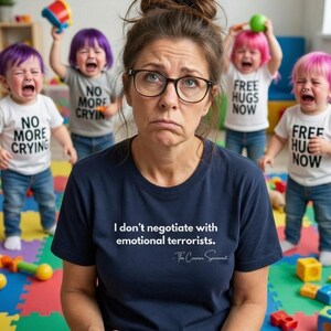 May include: A woman wearing glasses and a navy blue t-shirt with the text "I don't negotiate with emotional terrorists." is surrounded by crying toddlers with dyed hair. The toddlers wear shirts that say "NO MORE CRYING" and "FREE HUGS NOW".