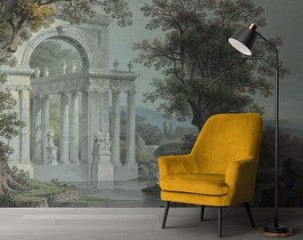 May include: A mustard yellow armchair with black legs sits in front of a mural depicting a classical landscape with a colonnade and statues. A black floor lamp with a gold accent is to the right.